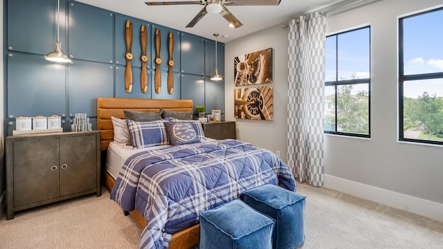 13206 Faberge Pl, Palm Beach Gardens, FL 33418 - carpeted bedroom with ceiling fan and baseboards
