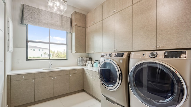 13206 Faberge Pl, Palm Beach Gardens, FL 33418 - washroom featuring cabinet space and washer and clothes dryer