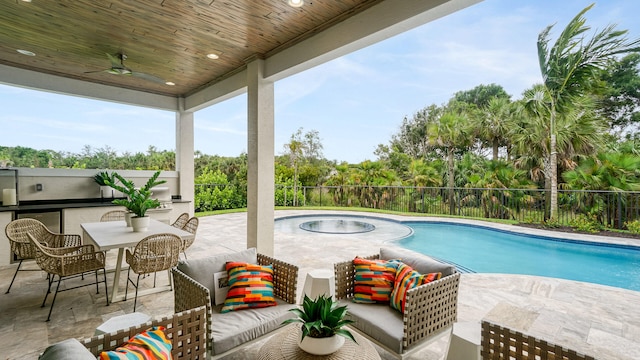 13206 Faberge Pl, Palm Beach Gardens, FL 33418 - view of swimming pool with a ceiling fan, a fenced backyard, a patio, an outdoor living space, and outdoor dining area