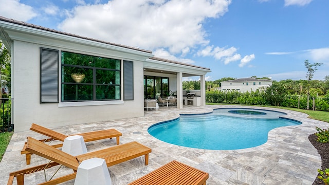 13206 Faberge Pl, Palm Beach Gardens, FL 33418 - view of pool with a patio area, an in-ground hot tub, and outdoor dining space