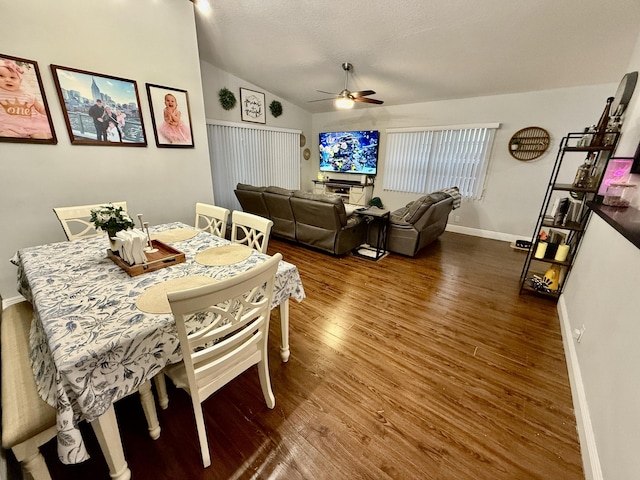 8421 SW 41st Ct, Davie, FL 33328 - dining room with a ceiling fan, wood finished floors, lofted ceiling, baseboards, and a textured ceiling