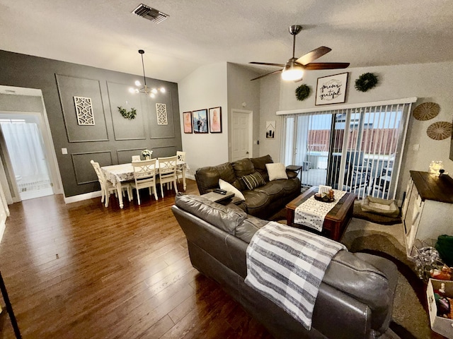 8421 SW 41st Ct, Davie, FL 33328 - living room with vaulted ceiling, wood-type flooring, a ceiling fan, a textured ceiling, and a chandelier