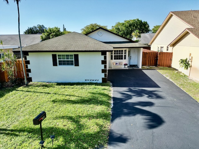 8421 SW 41st Ct, Davie, FL 33328 - ranch-style house featuring stucco siding, driveway, and roof with shingles