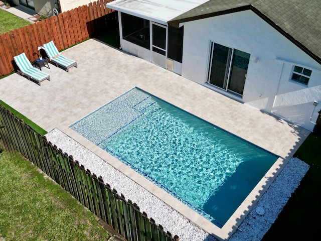 8421 SW 41st Ct, Davie, FL 33328 - view of pool featuring a patio, a fenced backyard, and a sunroom