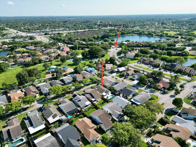 8421 SW 41st Ct, Davie, FL 33328 - aerial view of property and surrounding area with a nearby body of water and nearby suburban area