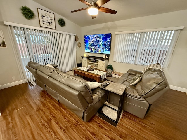 8421 SW 41st Ct, Davie, FL 33328 - living room with wood finished floors, a ceiling fan, baseboards, and vaulted ceiling