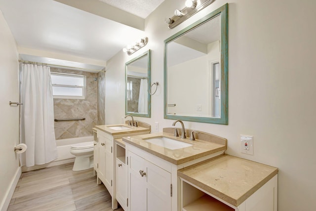 3640 N Ocean Dr Unit 427, Singer Island, FL 33404 - full bathroom with toilet, shower / bath combo with shower curtain, vanity, and wood finished floors