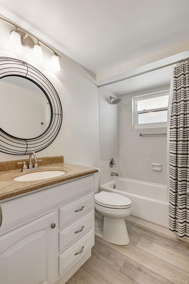3640 N Ocean Dr Unit 427, Singer Island, FL 33404 - full bath featuring shower / tub combo, vanity, toilet, and wood finished floors