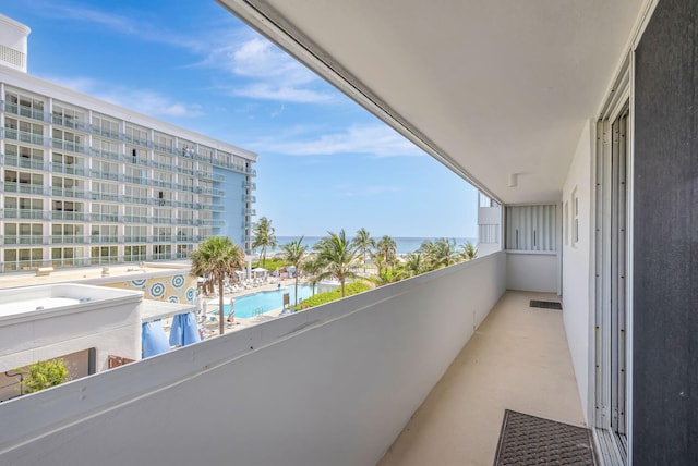3640 N Ocean Dr Unit 427, Singer Island, FL 33404 - balcony with view of pool area and a water view