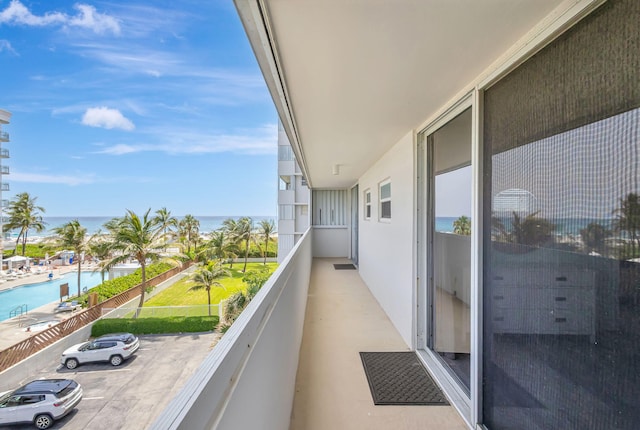 3640 N Ocean Dr Unit 427, Singer Island, FL 33404 - balcony featuring view of pool and a water view