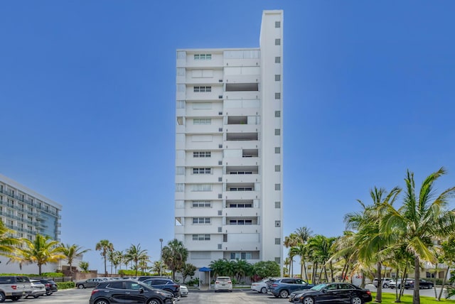 3640 N Ocean Dr Unit 427, Singer Island, FL 33404 - view of apartment building / complex featuring uncovered parking