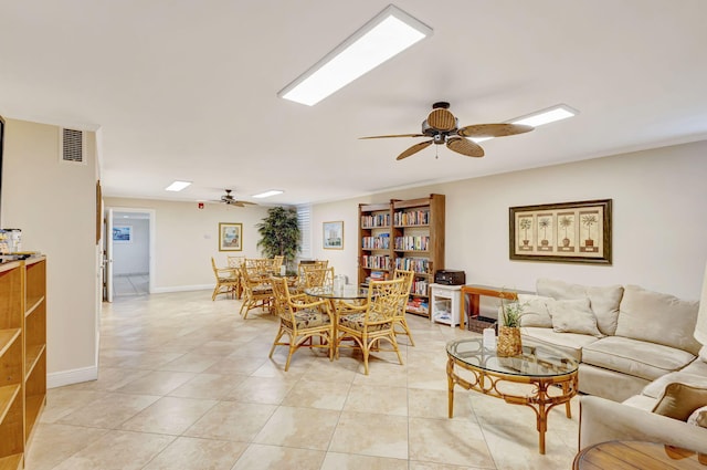 3640 N Ocean Dr Unit 427, Singer Island, FL 33404 - dining space with ceiling fan and light tile patterned flooring