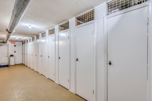 3640 N Ocean Dr Unit 427, Singer Island, FL 33404 - below grade area featuring a textured ceiling