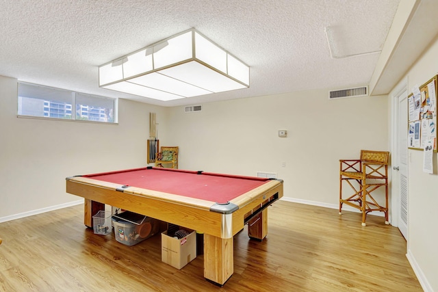 3640 N Ocean Dr Unit 427, Singer Island, FL 33404 - rec room with light wood-type flooring, billiards table, a textured ceiling, and baseboards