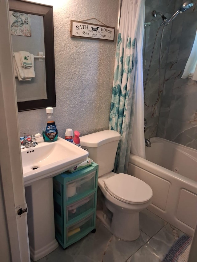 2506 Oleander Blvd, Fort Pierce, FL 34982 - bathroom featuring shower / bath combination with curtain, toilet, a textured wall, and marble finish flooring