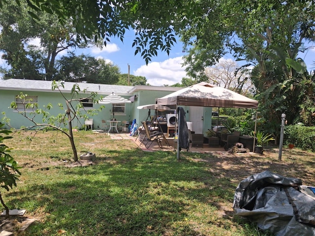 2506 Oleander Blvd, Fort Pierce, FL 34982 - view of grassy yard featuring a gazebo and a patio