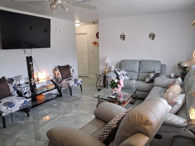 2506 Oleander Blvd, Fort Pierce, FL 34982 - living room featuring light marble finish flooring and a ceiling fan