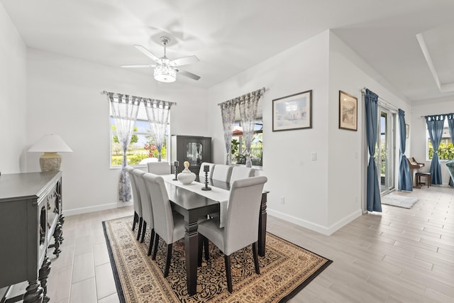 19404 Broad Shore Walk, Loxahatchee, FL 33470 - dining room with a ceiling fan, baseboards, and light wood finished floors