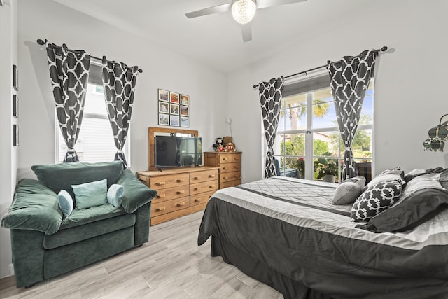 19404 Broad Shore Walk, Loxahatchee, FL 33470 - bedroom featuring light wood finished floors and a ceiling fan