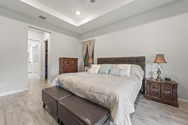 19404 Broad Shore Walk, Loxahatchee, FL 33470 - bedroom with wood finished floors, baseboards, ensuite bath, recessed lighting, and ceiling fan