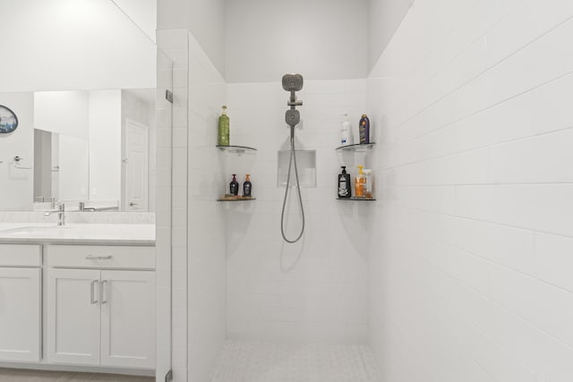 19404 Broad Shore Walk, Loxahatchee, FL 33470 - bathroom featuring a tile shower and vanity