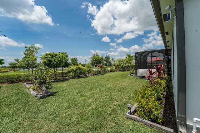 19404 Broad Shore Walk, Loxahatchee, FL 33470 - view of green lawn featuring glass enclosure