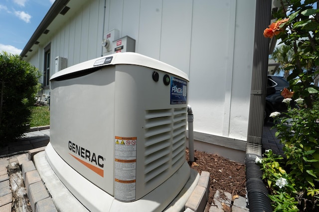 19404 Broad Shore Walk, Loxahatchee, FL 33470 - exterior view of a power unit and board and batten siding
