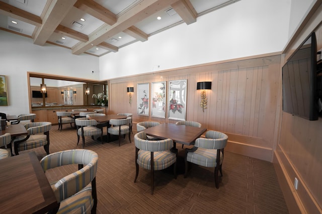 19404 Broad Shore Walk, Loxahatchee, FL 33470 - carpeted dining space with beam ceiling, wooden walls, a towering ceiling, and coffered ceiling