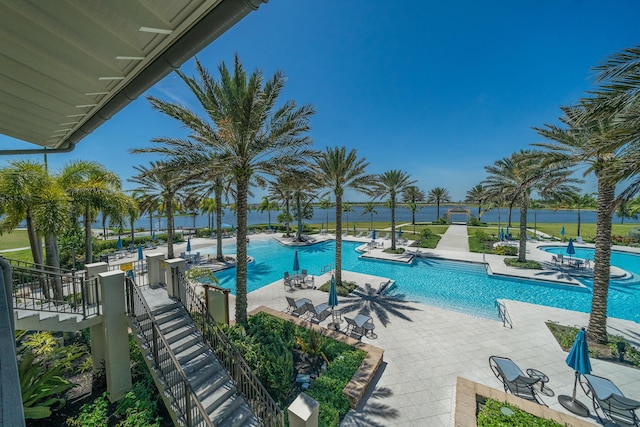 19404 Broad Shore Walk, Loxahatchee, FL 33470 - community pool featuring a patio