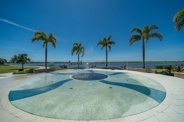 19404 Broad Shore Walk, Loxahatchee, FL 33470 - view of swimming pool featuring a water view