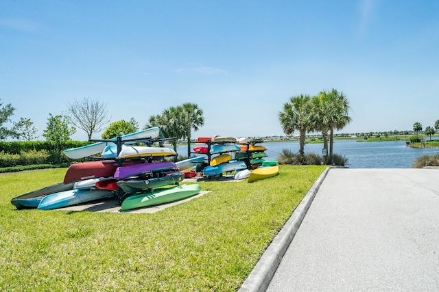 19404 Broad Shore Walk, Loxahatchee, FL 33470 - view of playground featuring a water view and a lawn