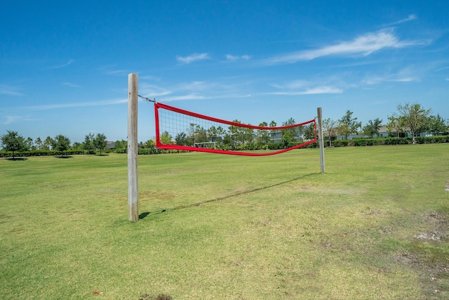 19404 Broad Shore Walk, Loxahatchee, FL 33470 - view of home's community with volleyball court and a lawn