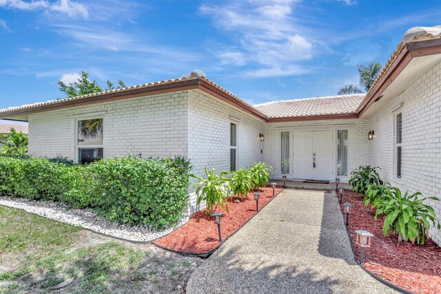 9062 NW 20th Mnr, Coral Springs, FL 33071 - entrance to property featuring brick siding
