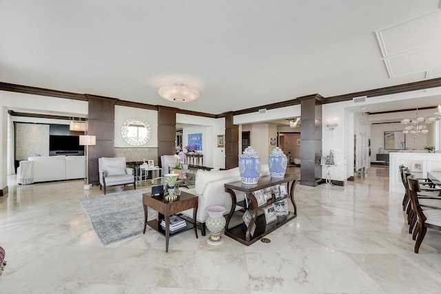 5050 N Ocean Dr Unit 1701, Singer Island, FL 33404 - living room featuring crown molding, ornate columns, marble tiled flooring, and a chandelier