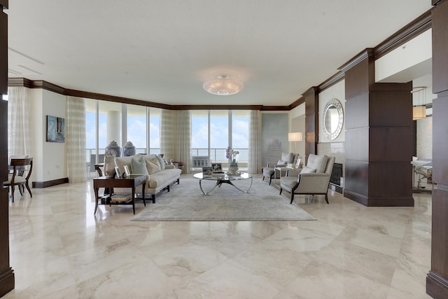 5050 N Ocean Dr Unit 1701, Singer Island, FL 33404 - living room with crown molding, healthy amount of natural light, and light marble finish floors