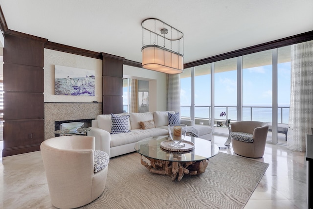 5050 N Ocean Dr Unit 1701, Singer Island, FL 33404 - living area featuring a wall of windows and a water view