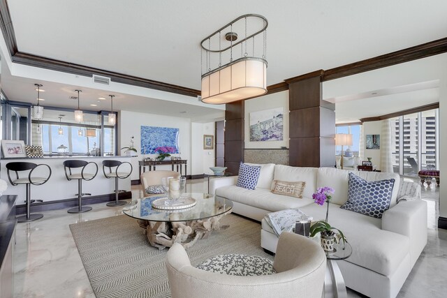 5050 N Ocean Dr Unit 1701, Singer Island, FL 33404 - living room with ornamental molding and marble finish floors