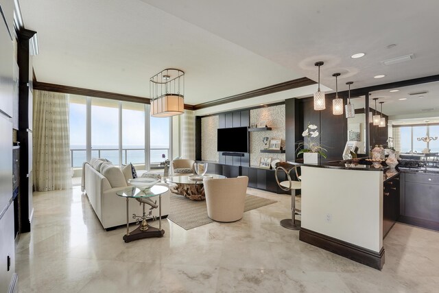 5050 N Ocean Dr Unit 1701, Singer Island, FL 33404 - living area with crown molding