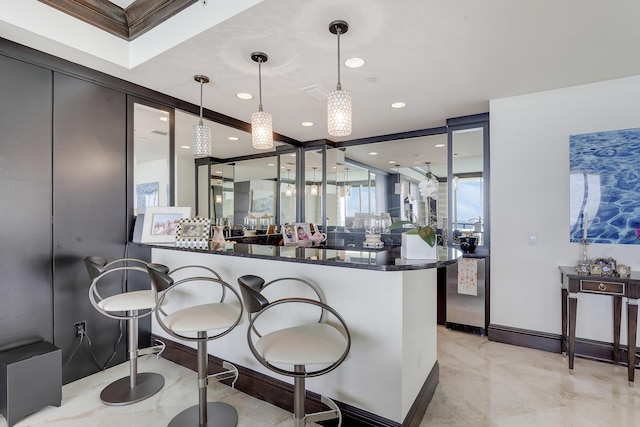 5050 N Ocean Dr Unit 1701, Singer Island, FL 33404 - bar area featuring hanging light fixtures, recessed lighting, baseboards, and light marble finish flooring