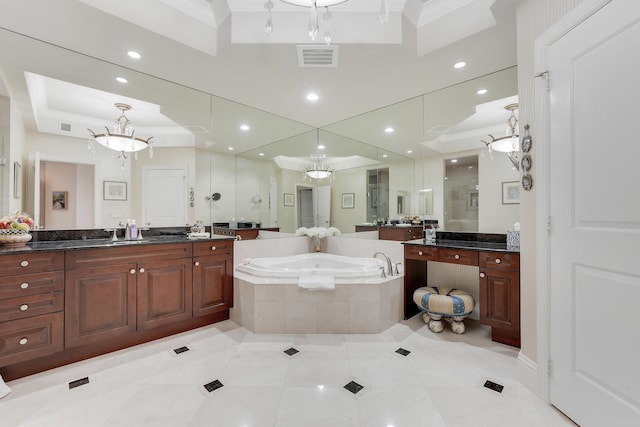 5050 N Ocean Dr Unit 1701, Singer Island, FL 33404 - full bath featuring tile patterned flooring, ornamental molding, a garden tub, a tray ceiling, and a shower stall