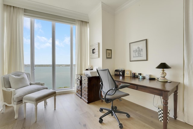 5050 N Ocean Dr Unit 1701, Singer Island, FL 33404 - home office with a water view, ornamental molding, and wood finished floors