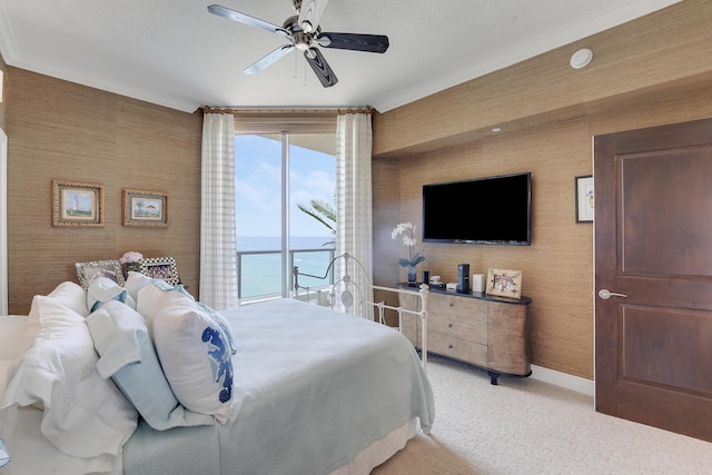 5050 N Ocean Dr Unit 1701, Singer Island, FL 33404 - bedroom with wallpapered walls, baseboards, light carpet, a ceiling fan, and crown molding