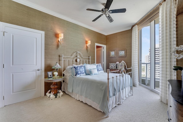 5050 N Ocean Dr Unit 1701, Singer Island, FL 33404 - bedroom with access to outside, light carpet, crown molding, and ceiling fan