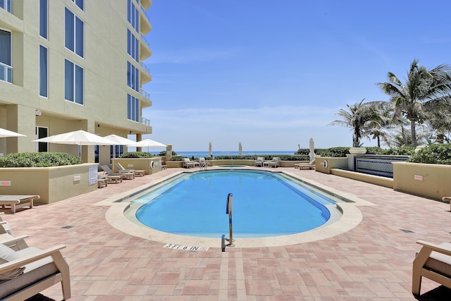 5050 N Ocean Dr Unit 1701, Singer Island, FL 33404 - community pool with a patio area