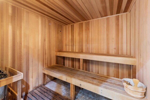 5050 N Ocean Dr Unit 1701, Singer Island, FL 33404 - relaxing sauna featuring wooden walls and wood ceiling