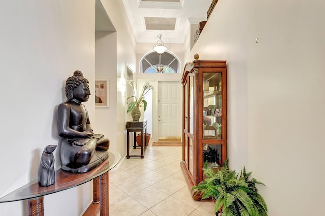 8127 Playa Del Sur Blvd, Lake Worth, FL 33467 - entrance foyer featuring crown molding, light tile patterned flooring, and a raised ceiling