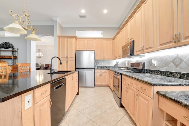 8127 Playa Del Sur Blvd, Lake Worth, FL 33467 - kitchen featuring appliances with stainless steel finishes, a sink, light brown cabinets, decorative backsplash, and crown molding