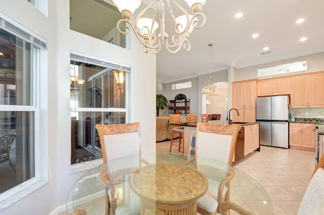 8127 Playa Del Sur Blvd, Lake Worth, FL 33467 - dining space featuring a chandelier, recessed lighting, ornamental molding, and light tile patterned floors