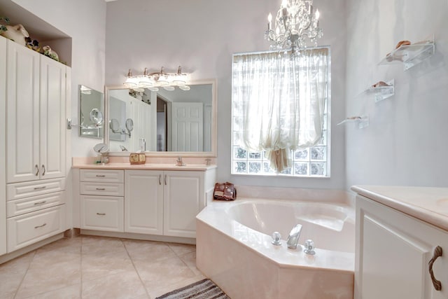 8127 Playa Del Sur Blvd, Lake Worth, FL 33467 - bathroom with vanity, a garden tub, a chandelier, and tile patterned flooring