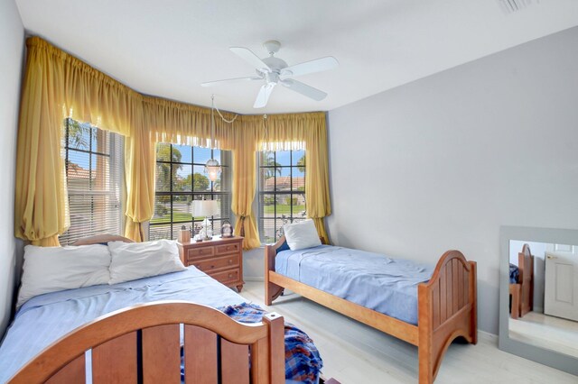 8127 Playa Del Sur Blvd, Lake Worth, FL 33467 - bedroom featuring baseboards and a ceiling fan